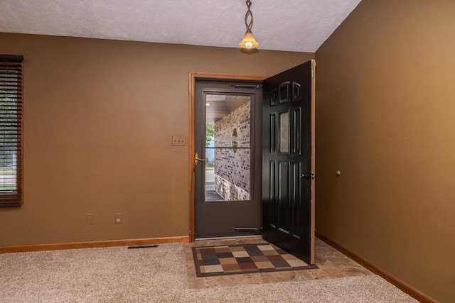 1413 Bethany Ln, Pontiac, IL 61764 - foyer with carpet floors and a textured ceiling