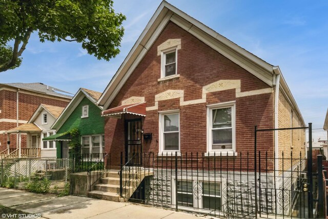 3417 S Morgan St, Chicago, IL 60608 - view of side of home featuring brick siding, roof with shingles, and a chimney