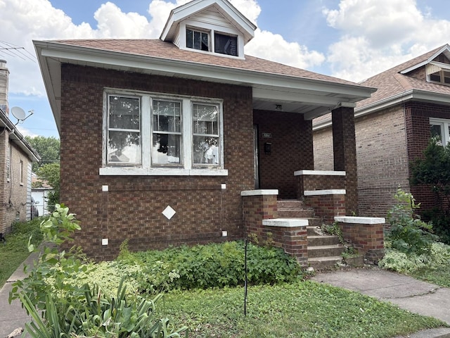 5535 S Fairfield Ave, Chicago, IL 60629 - view of front of house featuring brick siding and covered porch