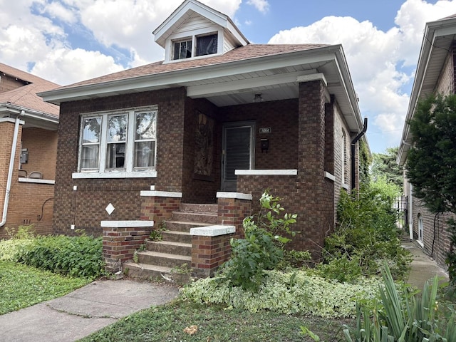 5535 S Fairfield Ave, Chicago, IL 60629 - view of front of home with brick siding and covered porch