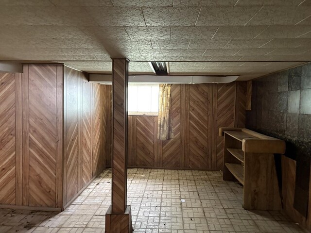 5535 S Fairfield Ave, Chicago, IL 60629 - basement with wooden walls and brick patterned floors
