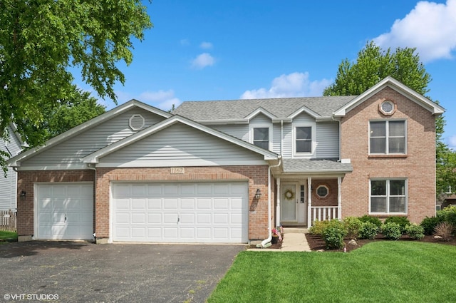 1167 Book Rd, Naperville, IL 60540 - traditional-style house featuring brick siding, asphalt driveway, a front lawn, and an attached garage