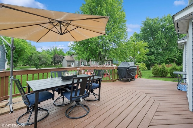 1167 Book Rd, Naperville, IL 60540 - wooden deck with outdoor dining space, a grill, and a yard