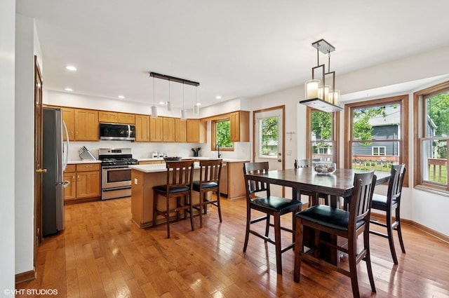 1167 Book Rd, Naperville, IL 60540 - dining room featuring light wood-type flooring and recessed lighting
