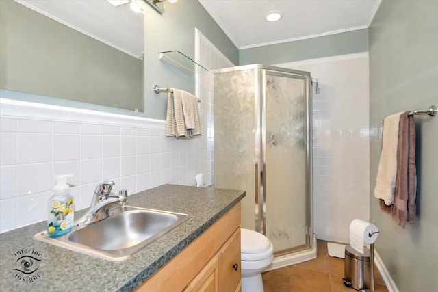 7117 W 82nd Pl, Burbank, IL 60459 - bathroom with a stall shower, vanity, tile patterned floors, tile walls, and ornamental molding