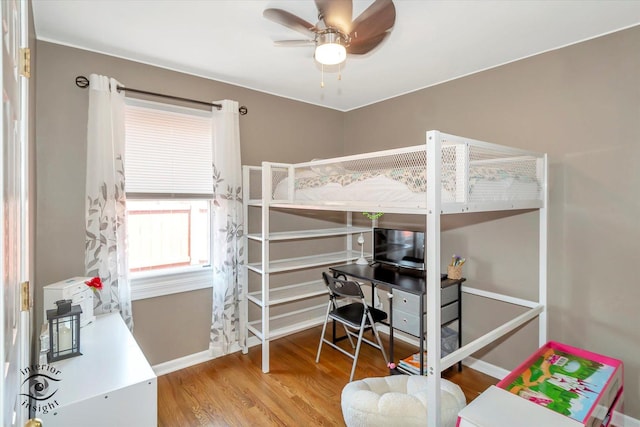 7117 W 82nd Pl, Burbank, IL 60459 - bedroom featuring wood finished floors and a desk