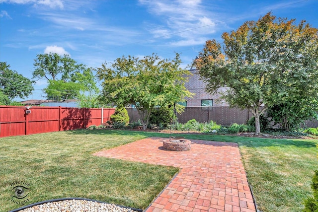 7117 W 82nd Pl, Burbank, IL 60459 - fenced backyard with a fire pit and a patio area