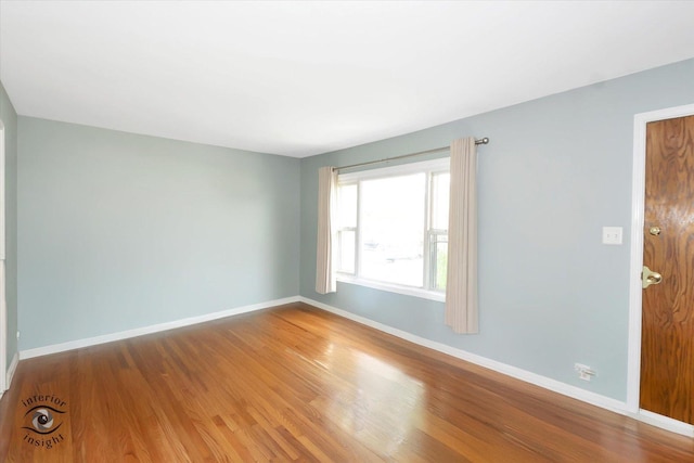 7117 W 82nd Pl, Burbank, IL 60459 - unfurnished room featuring baseboards and wood finished floors