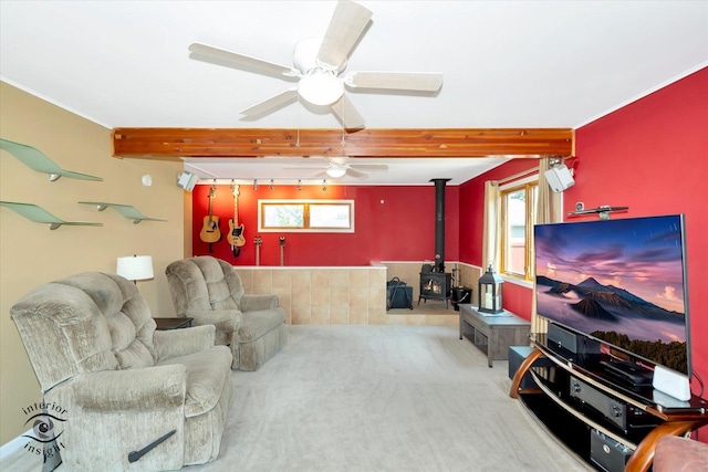 7117 W 82nd Pl, Burbank, IL 60459 - living room with a wood stove, carpet, beam ceiling, and a ceiling fan