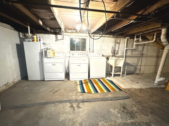 10007 S Hoxie Ave, Chicago, IL 60617 - unfinished basement featuring washer and dryer and a sink