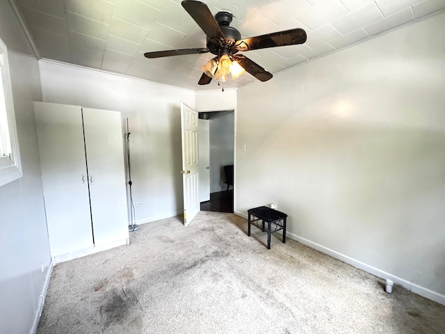 10007 S Hoxie Ave, Chicago, IL 60617 - unfurnished bedroom with carpet and a ceiling fan