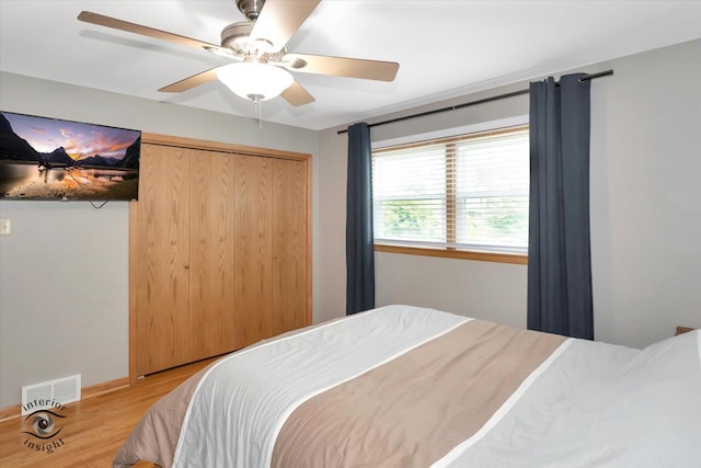 17436 71st Ave, Tinley Park, IL 60477 - bedroom with wood finished floors, a closet, and ceiling fan
