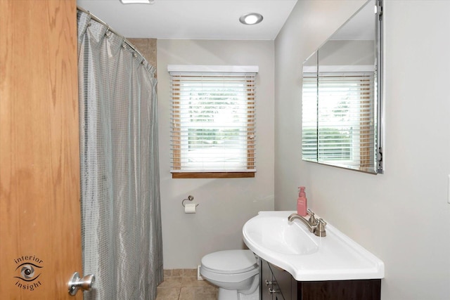 17436 71st Ave, Tinley Park, IL 60477 - bathroom with vanity, plenty of natural light, tile patterned floors, and a shower with shower curtain