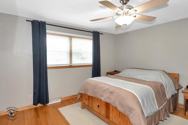 17436 71st Ave, Tinley Park, IL 60477 - bedroom featuring light wood finished floors and ceiling fan