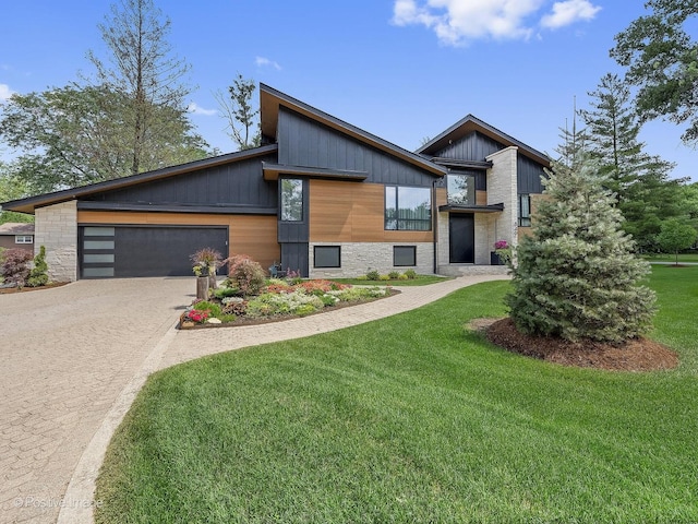 849 Cramer Ct, Willowbrook, IL 60527 - modern home featuring a front yard, decorative driveway, and an attached garage