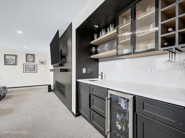 849 Cramer Ct, Willowbrook, IL 60527 - indoor dry bar featuring beverage cooler, a large fireplace, light colored carpet, and recessed lighting