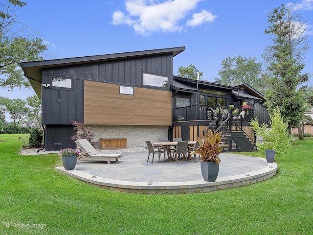 849 Cramer Ct, Willowbrook, IL 60527 - back of property with stairs, a patio area, a lawn, a wooden deck, and board and batten siding