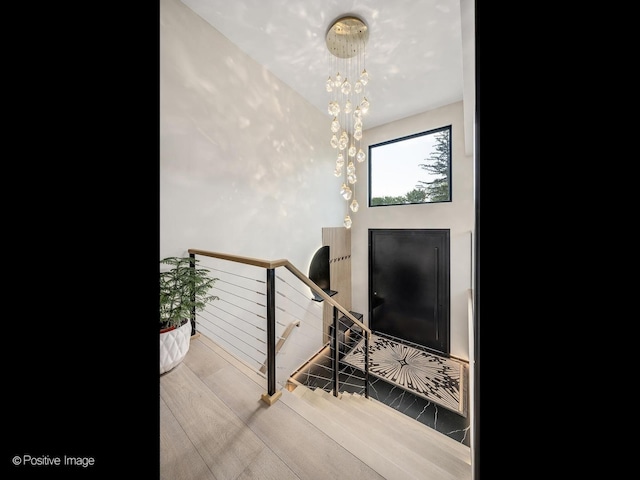 849 Cramer Ct, Willowbrook, IL 60527 - staircase featuring a chandelier