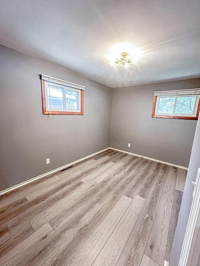 425 W Donald St, Kankakee, IL 60901 - unfurnished room with wood finished floors and baseboards