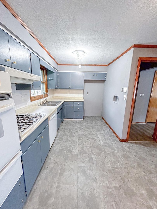 425 W Donald St, Kankakee, IL 60901 - kitchen with ornamental molding, white appliances, a warming drawer, blue cabinets, and a textured ceiling