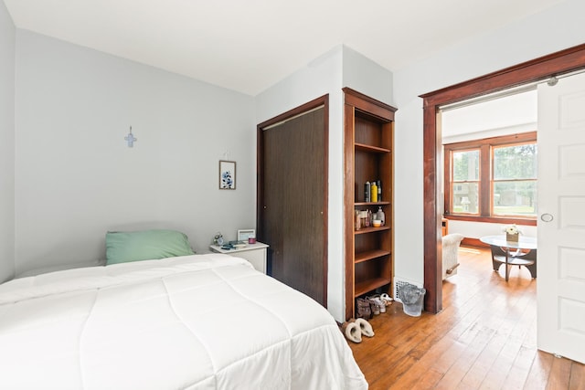 637/639 E Wilson St, Batavia, IL 60510 - bedroom with light wood-style flooring