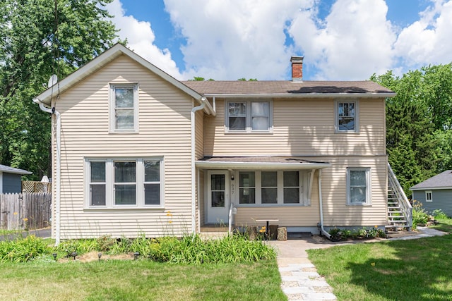 637/639 E Wilson St, Batavia, IL 60510 - traditional-style home with a chimney and stairway