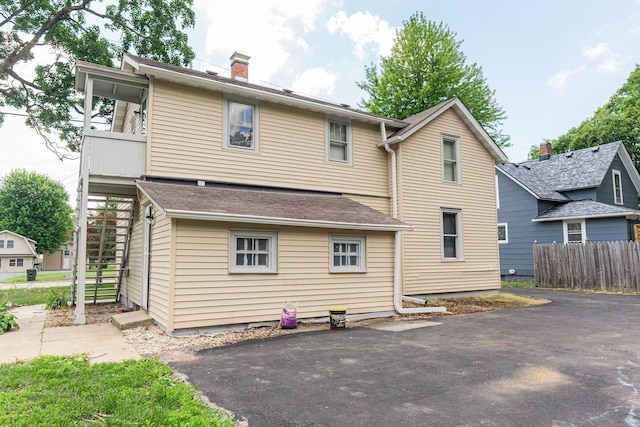 637/639 E Wilson St, Batavia, IL 60510 - back of house featuring a chimney