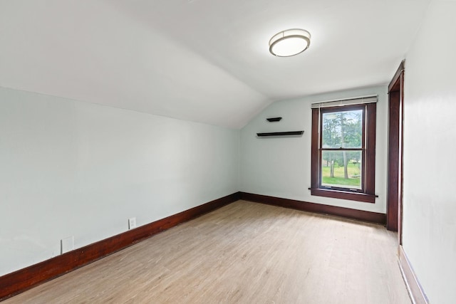 637/639 E Wilson St, Batavia, IL 60510 - additional living space with light wood-style floors and lofted ceiling