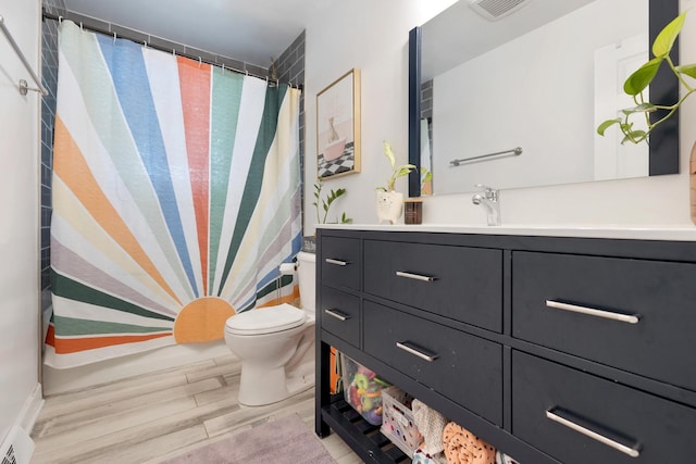 3S221 Sequoia Dr, Glen Ellyn, IL 60137 - bathroom with wood finished floors, vanity, and a shower with curtain