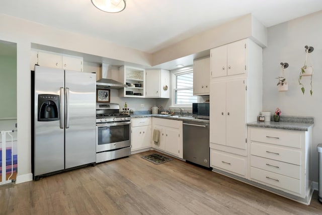3S221 Sequoia Dr, Glen Ellyn, IL 60137 - kitchen with stainless steel appliances, wall chimney range hood, white cabinetry, and light wood finished floors