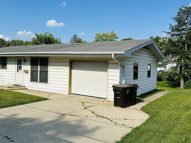 119 N Park Blvd, Freeport, IL 61032 - garage featuring driveway