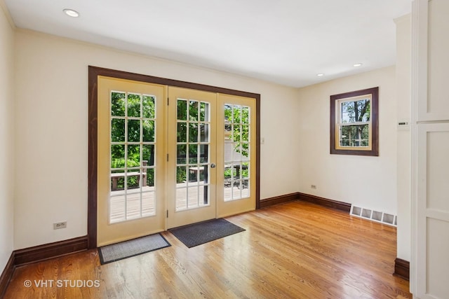 733 N Kensington Ave, La Grange Park, IL 60526 - doorway to outside featuring plenty of natural light, light wood-type flooring, french doors, and recessed lighting