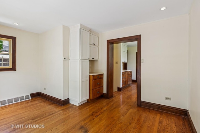 733 N Kensington Ave, La Grange Park, IL 60526 - spare room with wood finished floors and recessed lighting