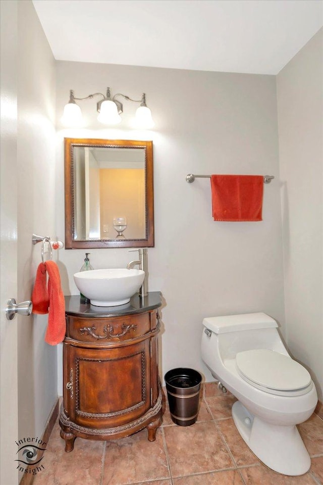 19126 Pierce Ave, Homewood, IL 60430 - half bath featuring vanity and tile patterned floors