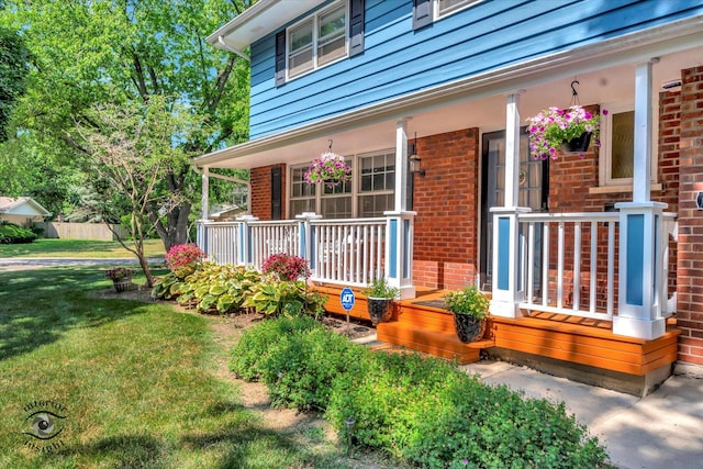 19126 Pierce Ave, Homewood, IL 60430 - entrance to property with a porch, brick siding, and a lawn