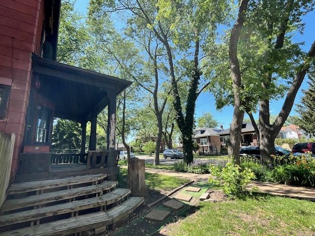 3651 W 64th Pl, Chicago, IL 60629 - view of yard featuring a porch