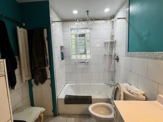 3651 W 64th Pl, Chicago, IL 60629 - full bath with tile walls, tub / shower combination, vanity, and tile patterned floors