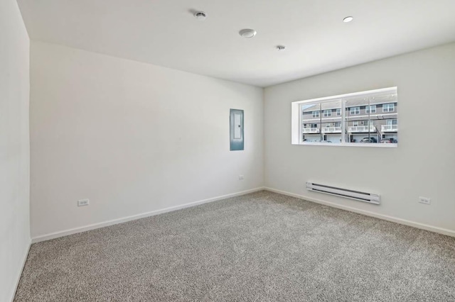 6339 Ulster Dr, Tinley Park, IL 60477 - empty room with a baseboard heating unit, electric panel, and carpet flooring
