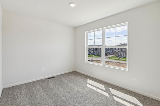 6339 Ulster Dr, Tinley Park, IL 60477 - carpeted empty room with baseboards