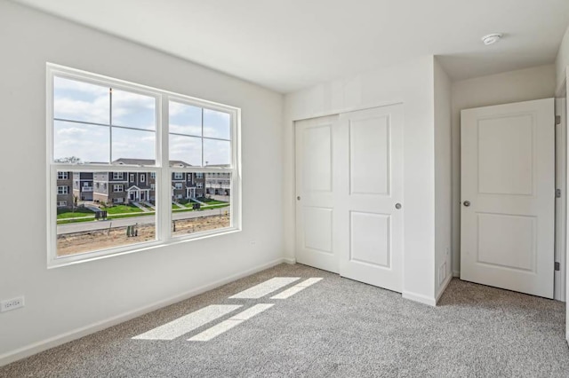 6339 Ulster Dr, Tinley Park, IL 60477 - unfurnished bedroom with carpet flooring and a closet
