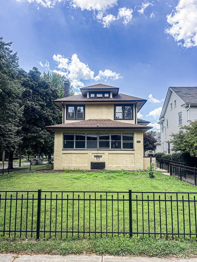 997 S Evergreen Ave, Kankakee, IL 60901 - view of front of home featuring stucco siding, a chimney, and a fenced backyard