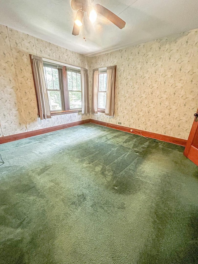 997 S Evergreen Ave, Kankakee, IL 60901 - carpeted spare room featuring ceiling fan and baseboards