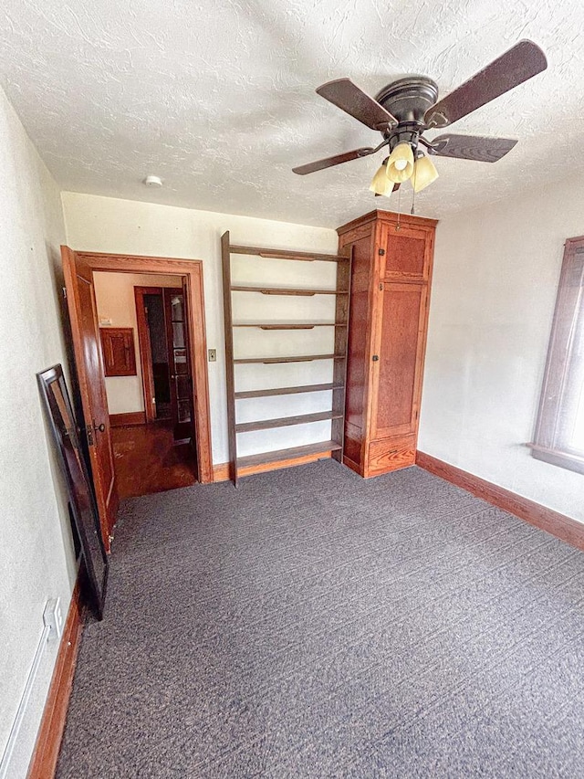 997 S Evergreen Ave, Kankakee, IL 60901 - carpeted spare room featuring a textured ceiling and ceiling fan
