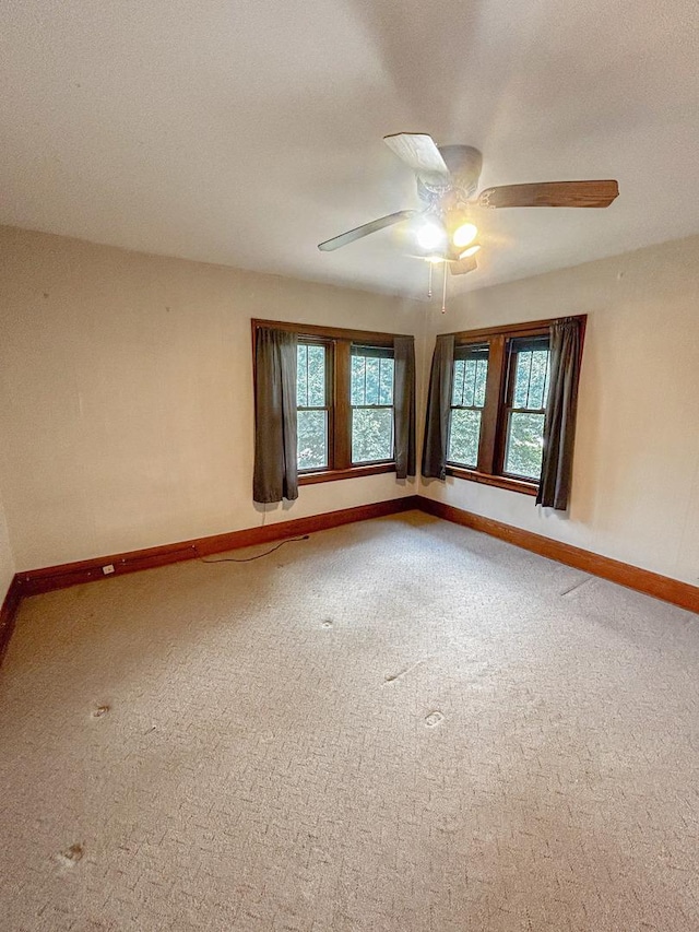 997 S Evergreen Ave, Kankakee, IL 60901 - carpeted spare room featuring healthy amount of natural light and ceiling fan