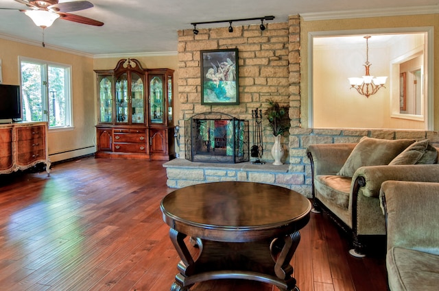 20798 White Oaks Rd, Morrison, IL 61270 - living area with track lighting, a baseboard heating unit, ceiling fan, hardwood / wood-style floors, and a chandelier