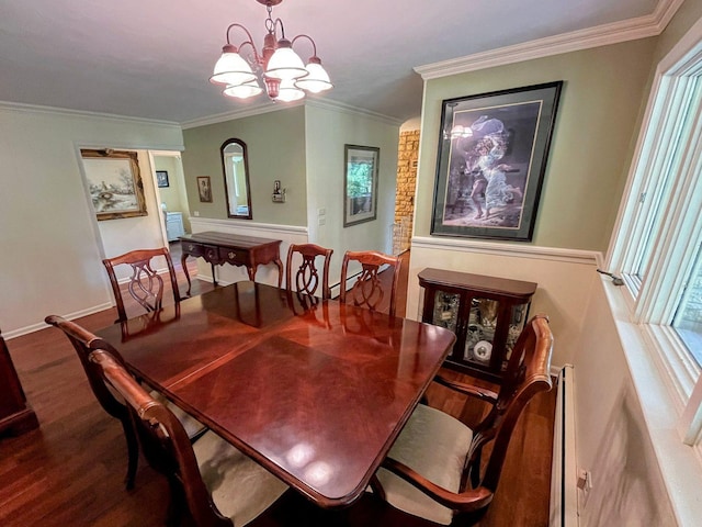 20798 White Oaks Rd, Morrison, IL 61270 - dining space with wood finished floors, a chandelier, ornamental molding, healthy amount of natural light, and a baseboard radiator
