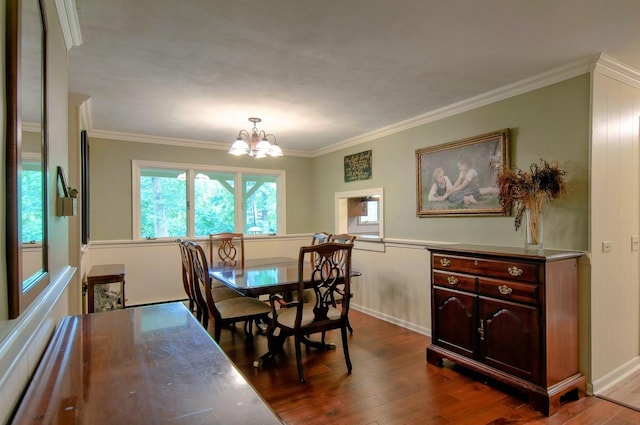 20798 White Oaks Rd, Morrison, IL 61270 - dining space with dark wood-style flooring, a chandelier, and crown molding