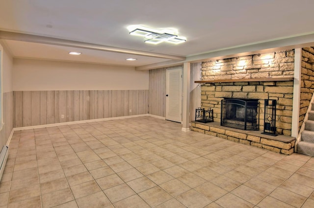 20798 White Oaks Rd, Morrison, IL 61270 - finished below grade area featuring a wainscoted wall and a stone fireplace