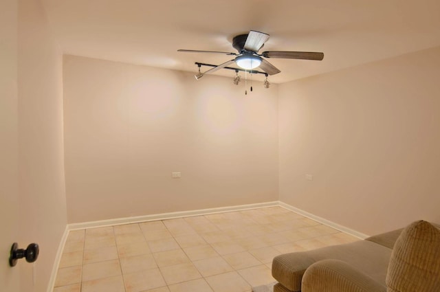 20798 White Oaks Rd, Morrison, IL 61270 - empty room featuring a ceiling fan and light tile patterned floors
