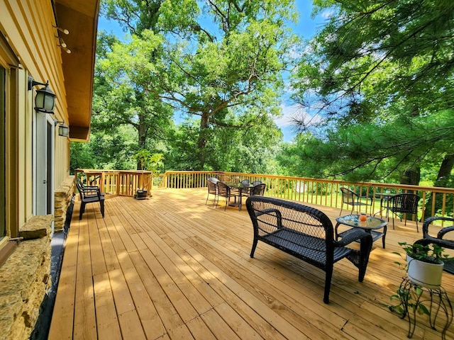 20798 White Oaks Rd, Morrison, IL 61270 - wooden terrace with outdoor dining area and view of scattered trees